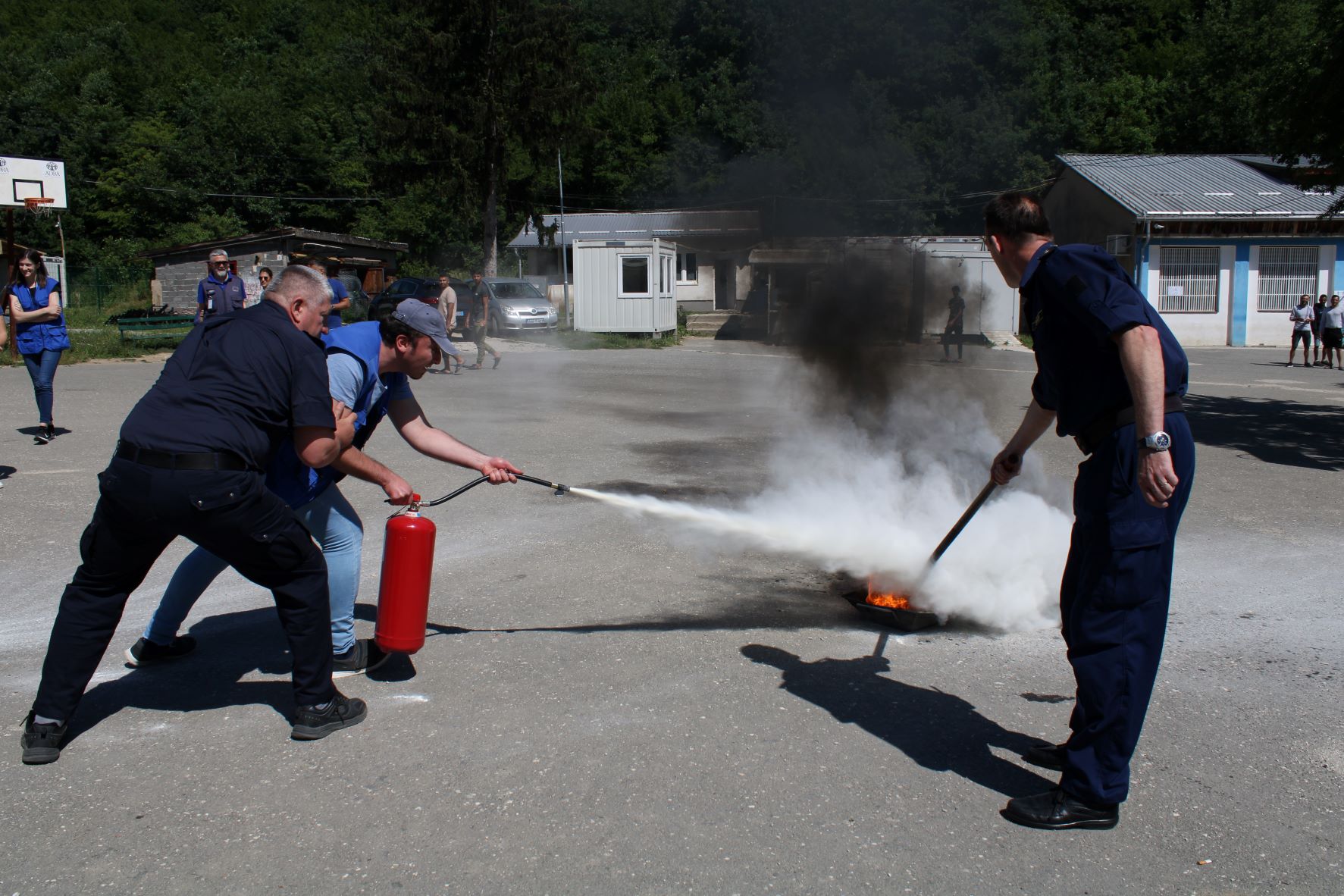 Demonstration of firefighting techniques in one of the temporary reception centres